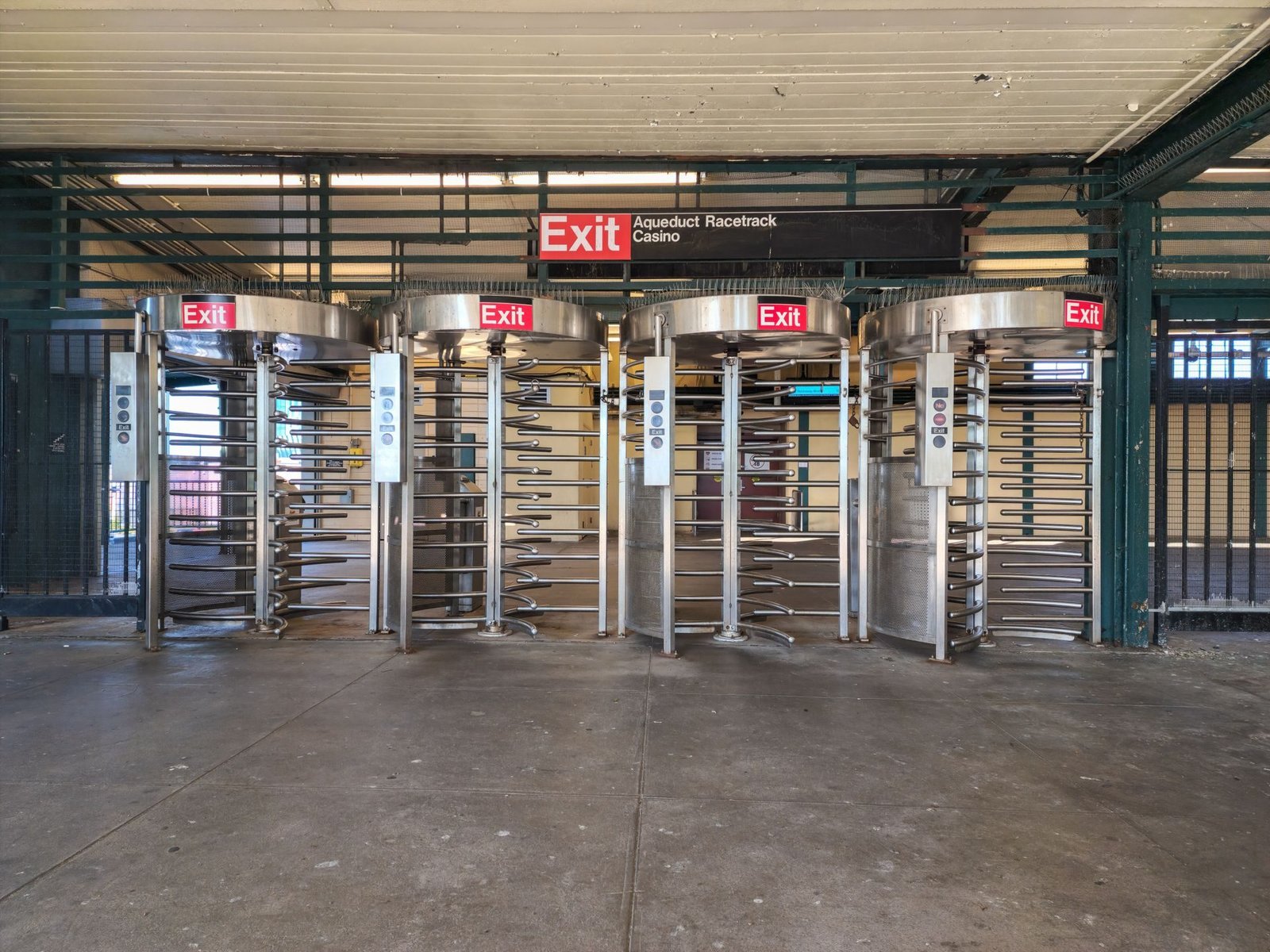 Tripod turnstile gates at a building entrance
