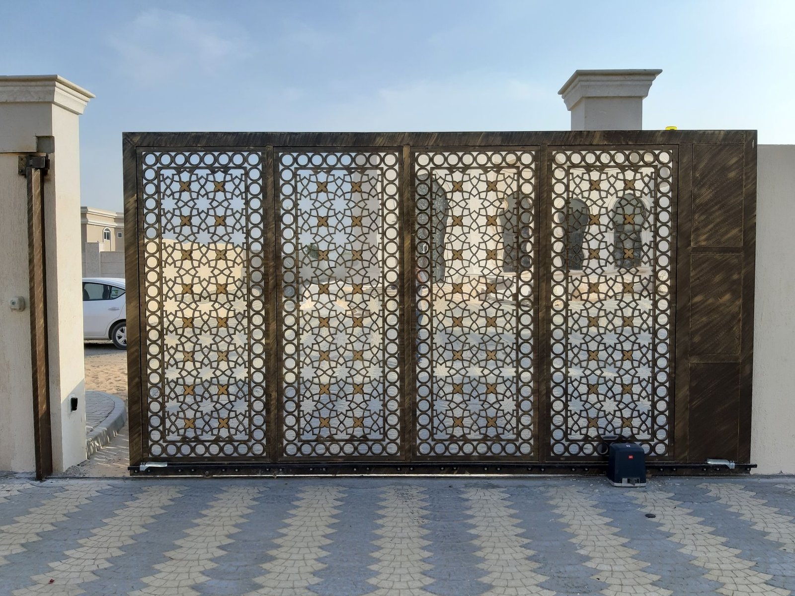 A decorative automatic metal entrance gate