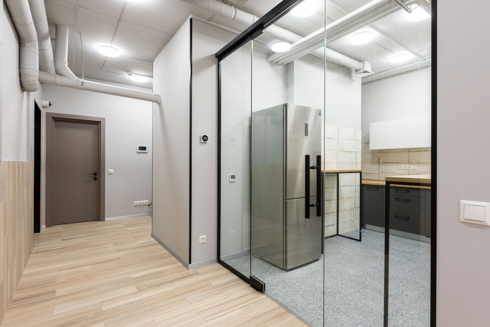 A frameless glass door in an office