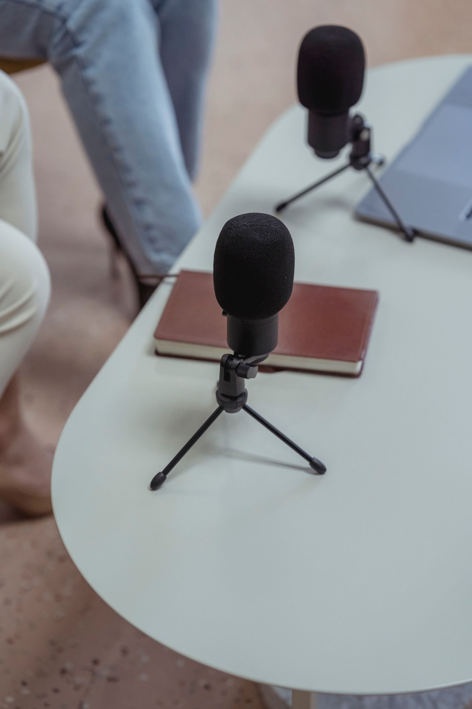 A microphone on a desk stand