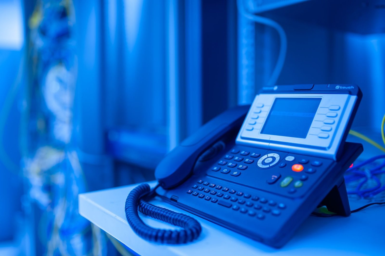 A desk IP phone with a display and keypad