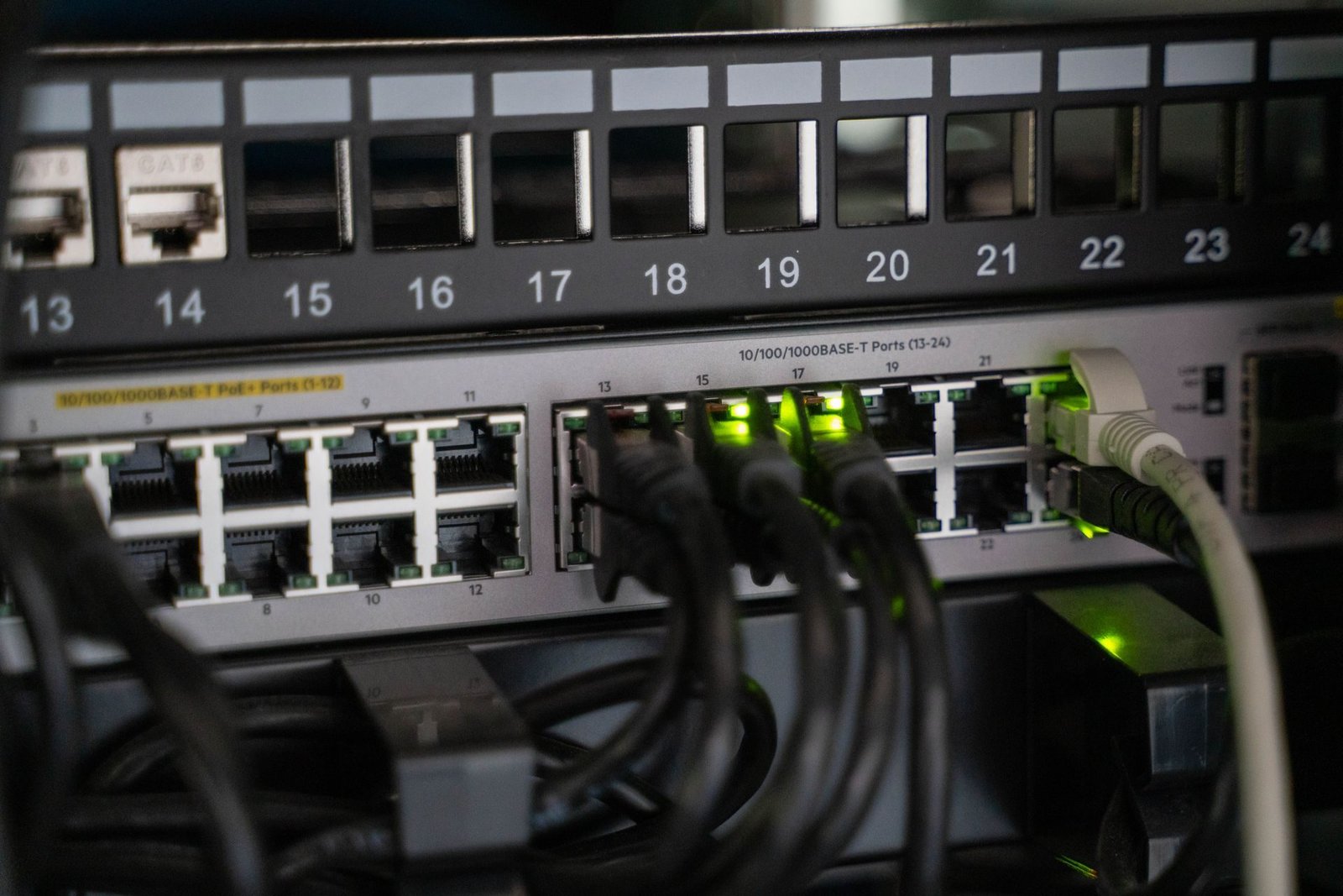A network switch with patch cables in every port