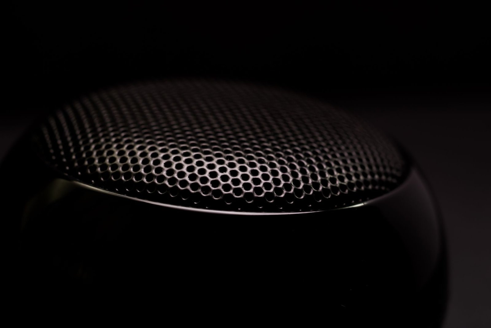 Close-up of a black loudspeaker grille